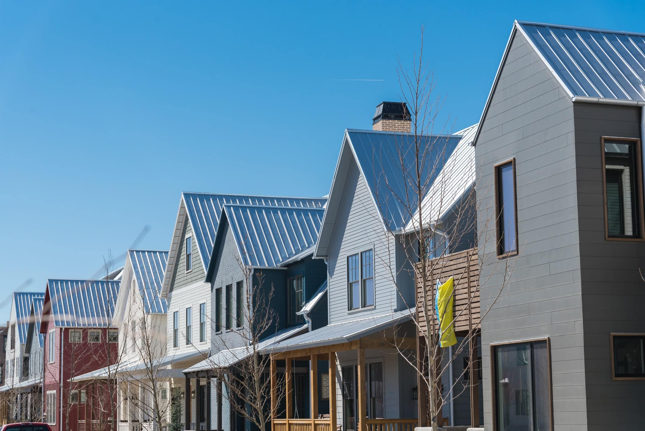 New development townhome with metal roof and covered gutters near Oklahoma City, US